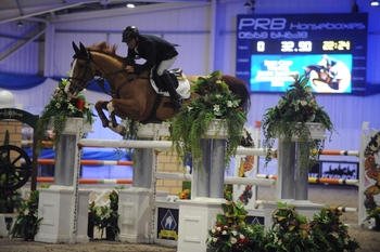 Jamie Wingrove lifts the Blue Chip Grand Prix from the front at the Blue Chip Show Jumping Championships