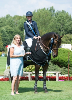 Michaela Webb triumphs in the SEIB Winter Novice Championship at Hickstead’s BHS Royal International Horse Show