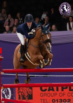 Lily Attwood triumphs on the opening day of International Showjumping at Horse of the Year Show