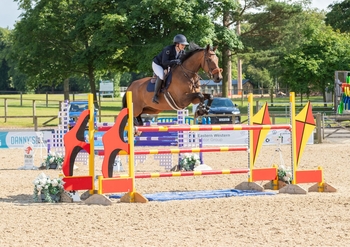 Aileen Craig is victorious in the Redpost Equestrian Foxhunter Second Round at the Scottish Summer Extravaganza